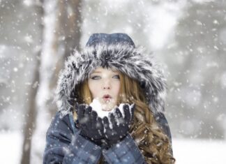 How to Keep Your Home Warm in Winter woman, snow, blow